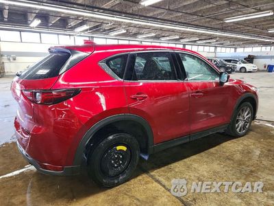 Trzecie zdjęcie samochodu z tyłu: 2021 MAZDA CX-5 GRAND TOURING VIN:JM3KFADM0M0381503 - miniatura