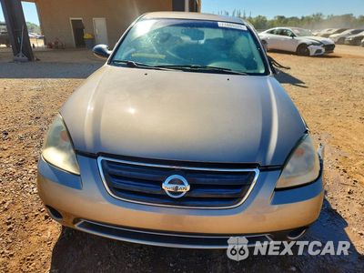 Piąte zdjęcie samochodu w środku: 2003 NISSAN ALTIMA 2.5 S VIN:1N4AL11E43C321625 - miniatura