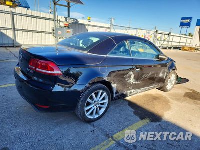 Trzecie zdjęcie samochodu z tyłu: 2016 VOLKSWAGEN EOS KOMFORT VIN:WVWBW8AH9GV000571 - miniatura