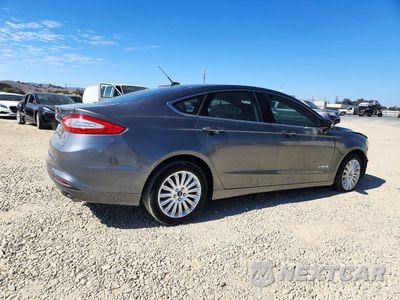 Trzecie zdjęcie samochodu z tyłu: 2014 FORD FUSION SE HYBRID VIN:3FA6P0LU7ER129726 - miniatura