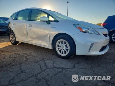 Czwarte zdjęcie samochodu z boku: 2014 TOYOTA PRIUS V THREE VIN:JTDZN3EU2EJ012500 - miniatura