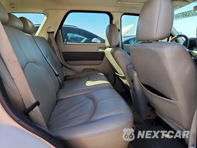 Zdjęcie 10 z 13 samochodu: 2009 MERCURY MARINER PREMIER VIN:4M2CU97759KJ10918 - miniatura
