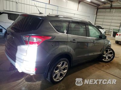 Trzecie zdjęcie samochodu z tyłu: 2017 FORD ESCAPE TITANIUM VIN:1FMCU9J93HUA78713 - miniatura
