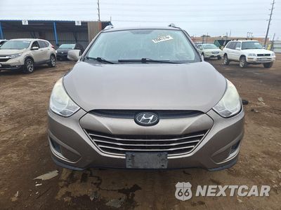 Piąte zdjęcie samochodu w środku: 2011 HYUNDAI TUCSON GLS VIN:KM8JUCAC0BU257900 - miniatura