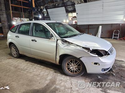 Czwarte zdjęcie samochodu z boku: 2006 FORD FOCUS ZX5 VIN:1FAFP37N16W167701 - miniatura