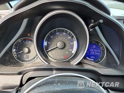 Zdjęcie 9 z 12 samochodu: 2016 HONDA FIT EX VIN:JHMGK5H78GX033142 - miniatura