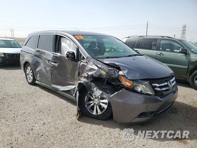 Czwarte zdjęcie samochodu z boku: 2016 HONDA ODYSSEY SE VIN:5FNRL5H31GB142363 - miniatura
