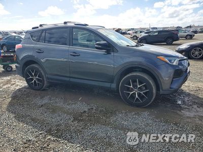 Czwarte zdjęcie samochodu z boku: 2017 TOYOTA RAV4 SE VIN:JTMNFREV9HD097765 - miniatura
