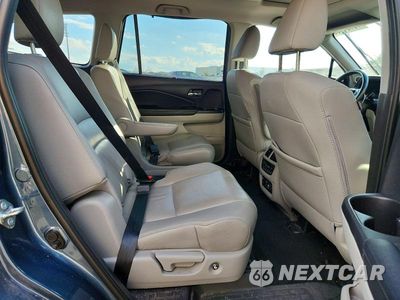 Zdjęcie 11 z 14 samochodu: 2019 HONDA PILOT TOURING VIN:5FNYF5H61KB012184 - miniatura