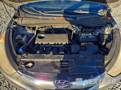 Zdjęcie 12 z 13 samochodu: 2011 HYUNDAI TUCSON LIMITED VIN:KM8JUCAC2BU227362 - miniatura
