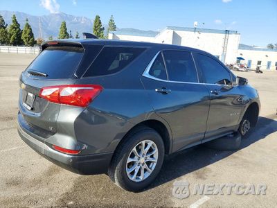 Trzecie zdjęcie samochodu z tyłu: 2018 CHEVROLET EQUINOX LT VIN:3GNAXJEV0JS512563 - miniatura