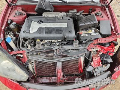 Zdjęcie 11 z 12 samochodu: 2007 HYUNDAI TIBURON GS VIN:KMHHM66D87U240559 - miniatura