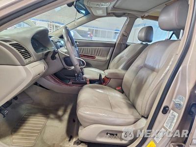 Zdjęcie 7 z 13 samochodu: 2002 TOYOTA CAMRY XLE VIN:4T1BE30K12U013506 - miniatura