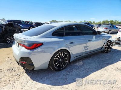 Trzecie zdjęcie samochodu z tyłu: 2022 BMW M440XI GRAN COUPE VIN:WBA13AW02NFM70511 - miniatura