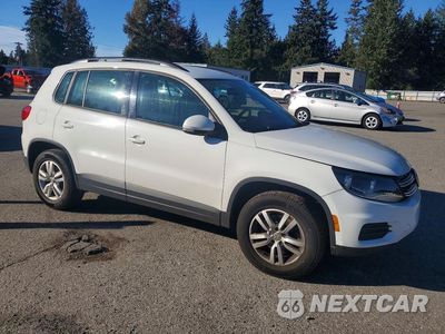Czwarte zdjęcie samochodu z boku: 2016 VOLKSWAGEN TIGUAN S VIN:WVGBV7AX5GW580668 - miniatura