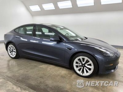 Czwarte zdjęcie samochodu z boku: 2022 TESLA MODEL 3 VIN:5YJ3E1EBXNF287662 - miniatura