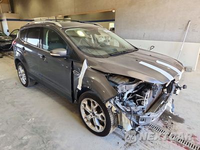 Czwarte zdjęcie samochodu z boku: 2013 FORD ESCAPE TITANIUM VIN:1FMCU9J96DUB84115 - miniatura