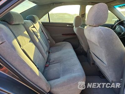 Zdjęcie 10 z 12 samochodu: 2003 TOYOTA CAMRY XLE VIN:4T1BE30KX3U685078 - miniatura