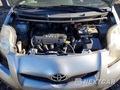 Zdjęcie 11 z 12 samochodu: 2009 TOYOTA YARIS BASE VIN:JTDJT903695266018 - miniatura