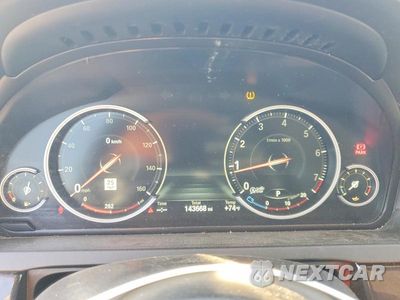 Zdjęcie 9 z 12 samochodu: 2014 BMW 740 I VIN:WBAYA6C53ED144486 - miniatura