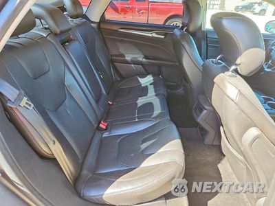 Zdjęcie 10 z 13 samochodu: 2013 FORD FUSION TITANIUM PHEV VIN:3FA6P0SU0DR332425 - miniatura