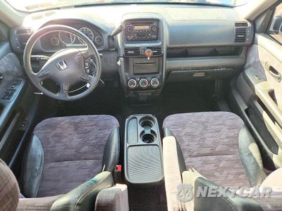 Zdjęcie 8 z 13 samochodu: 2003 HONDA CR-V LX VIN:SHSRD68423U101061 - miniatura