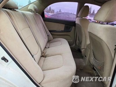 Zdjęcie 10 z 13 samochodu: 2006 KIA SPECTRA EX VIN:KNAFE121365273370 - miniatura