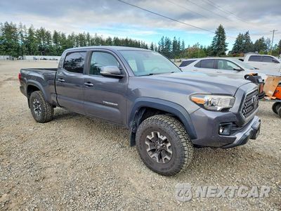 Czwarte zdjęcie samochodu z boku: 2018 TOYOTA TACOMA TRD OFF-ROAD VIN:3TMDZ5BN3JM041332 - miniatura