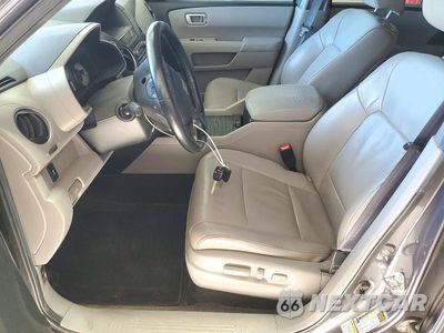Zdjęcie 7 z 13 samochodu: 2014 HONDA PILOT EXL VIN:5FNYF4H62EB042454 - miniatura