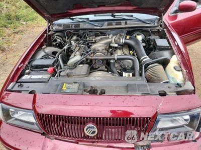 Zdjęcie 11 z 12 samochodu: 2004 MERCURY MARAUDER VIN:2MHHM79V54X666603 - miniatura