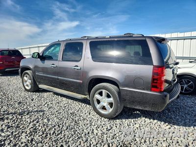Drugie zdjęcie samochodu z przodu: 2010 CHEVROLET SUBURBAN K1500 LTZ VIN:1GNUKKE36AR103826 - miniatura