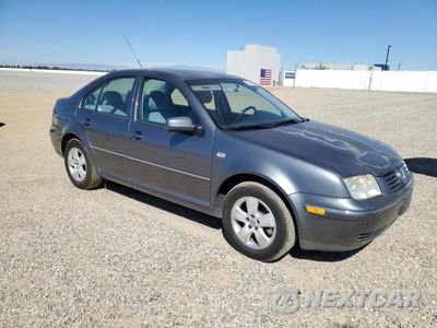 Czwarte zdjęcie samochodu z boku: 2004 VOLKSWAGEN JETTA GLS VIN:3VWSA69M04M065185 - miniatura
