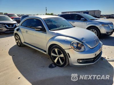 Czwarte zdjęcie samochodu z boku: 2013 VOLKSWAGEN BEETLE TURBO VIN:3VWV67AT7DM608829 - miniatura