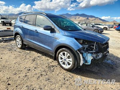Czwarte zdjęcie samochodu z boku: 2018 FORD ESCAPE SE VIN:1FMCU0GD0JUB44311 - miniatura