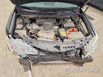 Zdjęcie 11 z 13 samochodu: 2012 TOYOTA CAMRY HYBRID LE VIN:4T1BD1FK9CU034524 - miniatura