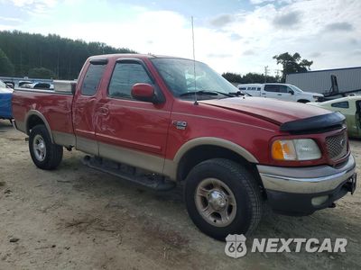 Czwarte zdjęcie samochodu z boku: 2002 FORD F150 VIN:1FTRX18L12NB07040 - miniatura