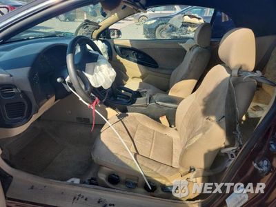 Zdjęcie 7 z 12 samochodu: 1999 MITSUBISHI ECLIPSE SPYDER GS VIN:4A3AX35G7XE045826 - miniatura