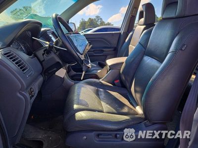 Zdjęcie 7 z 13 samochodu: 2004 HONDA PILOT EXL VIN:2HKYF18554H532506 - miniatura