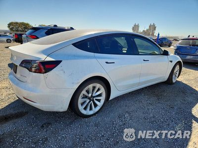 Trzecie zdjęcie samochodu z tyłu: 2022 TESLA MODEL 3 VIN:5YJ3E1EB0NF143585 - miniatura