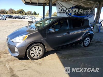 2014 TOYOTA PRIUS C TWO JTDKDTB36E1570575 - główne zdjęcie licytacji z USA - miniatura