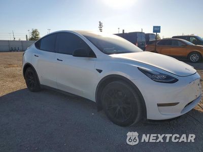 Czwarte zdjęcie samochodu z boku: 2020 TESLA MODEL Y VIN:5YJYGDEE2LF056716 - miniatura