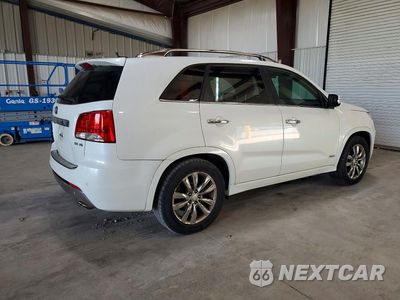 Trzecie zdjęcie samochodu z tyłu: 2012 KIA SORENTO SX VIN:5XYKWDA28CG269621 - miniatura