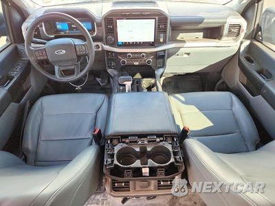 Zdjęcie 8 z 12 samochodu: 2023 FORD F150 LIGHTNING PRO VIN:1FTVW1EL6PWG41304 - miniatura