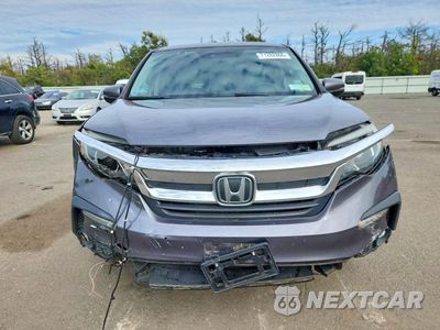 Piąte zdjęcie samochodu w środku: 2020 HONDA PILOT EXL VIN:5FNYF6H57LB028064 - miniatura