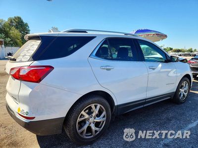 Trzecie zdjęcie samochodu z tyłu: 2018 CHEVROLET EQUINOX PREMIER VIN:3GNAXMEV6JS504470 - miniatura