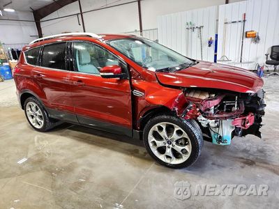 Czwarte zdjęcie samochodu z boku: 2016 FORD ESCAPE TITANIUM VIN:1FMCU0J9XGUC10974 - miniatura