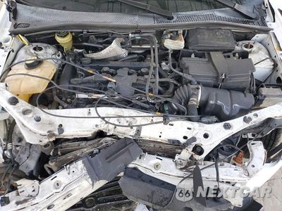 Zdjęcie 11 z 13 samochodu: 2006 FORD FOCUS ZX4 VIN:1FAHP34N06W130619 - miniatura