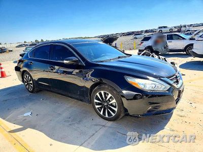 Czwarte zdjęcie samochodu z boku: 2018 NISSAN ALTIMA 2.5 SL VIN:1N4AL3AP1JC100817 - miniatura