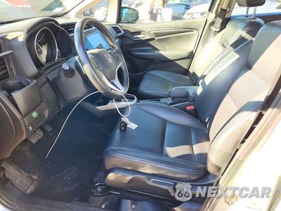 Zdjęcie 7 z 13 samochodu: 2016 HONDA FIT EX VIN:3HGGK5H98GM703394 - miniatura