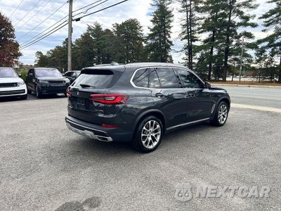 Czwarte zdjęcie samochodu z boku: 2021 BMW X5 XDRIVE45E VIN:5UXTA6C00M9E52431 - miniatura